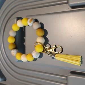 SPECIAL PRICE - Yellow floral Wristlet with tassel NEW